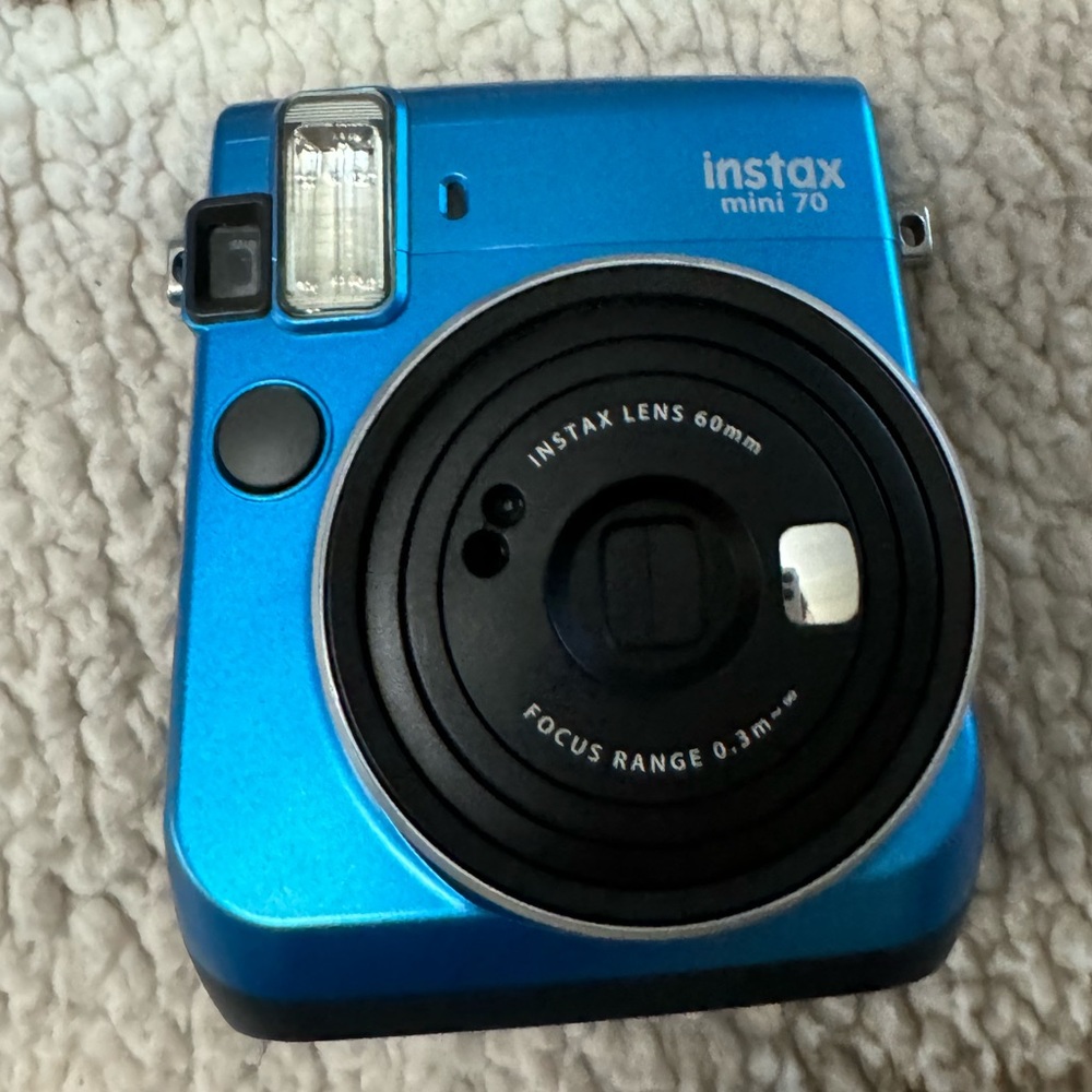 Instax mini 70 camera with film! (: